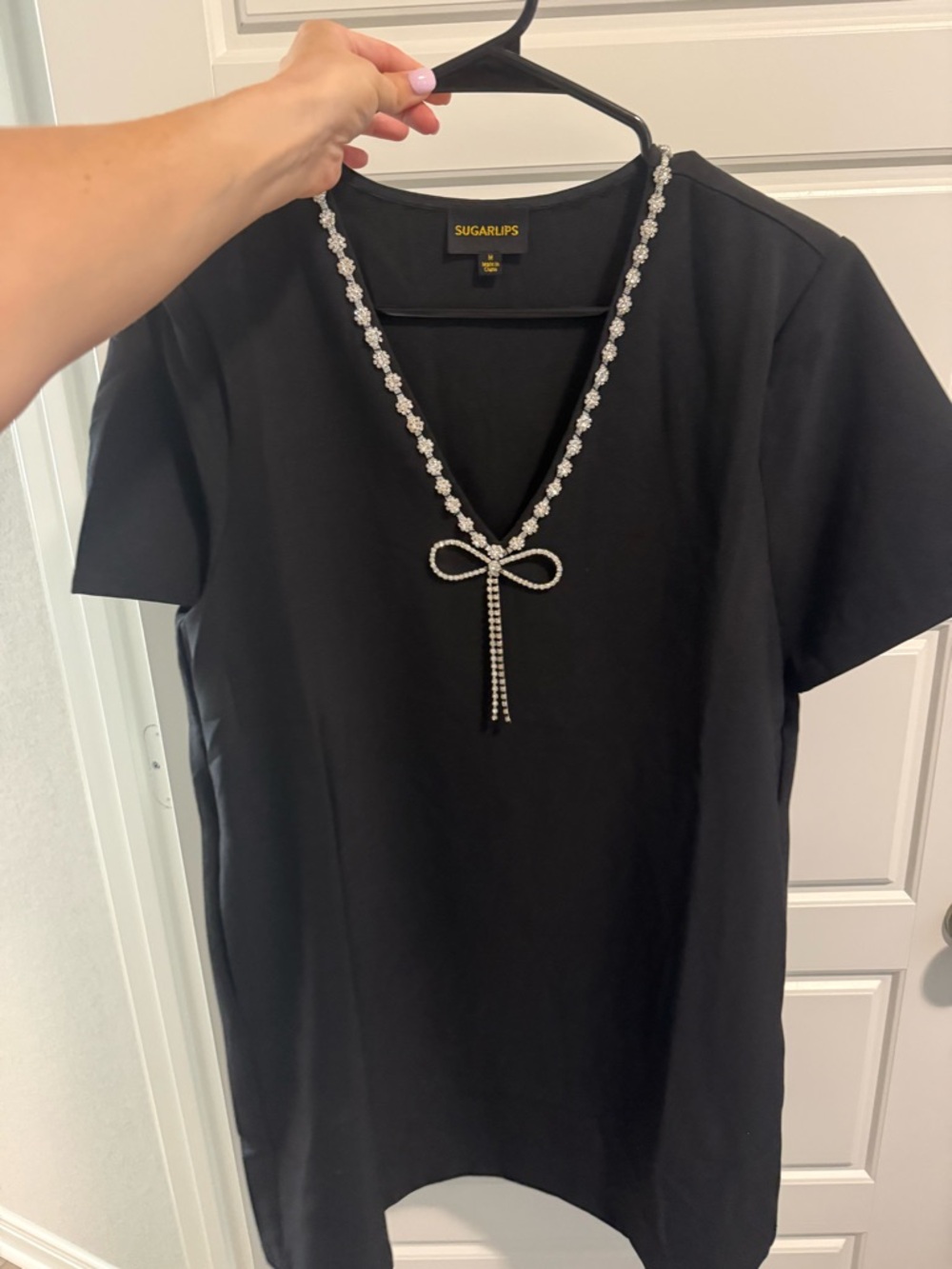 Sugarlips Black V-Neck Dress with Rhinestone Bow Detail